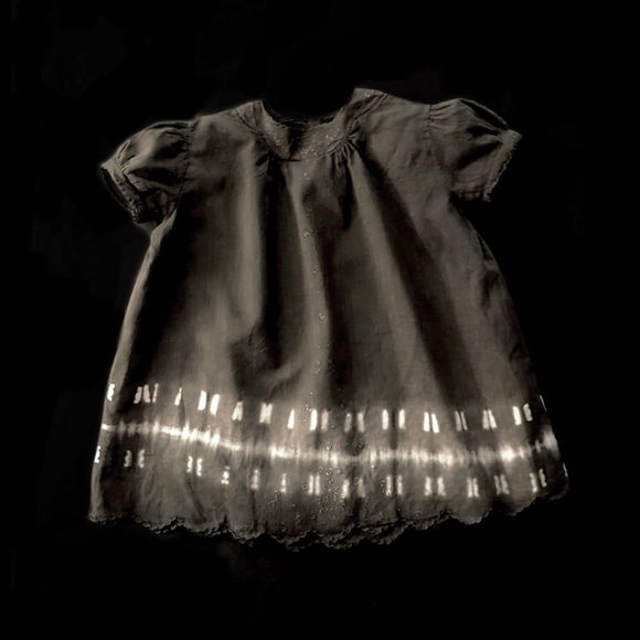 BABY DRESS:  naturally dyed with walnuts from our very own HOPE Garden, Shibori hem pattern
